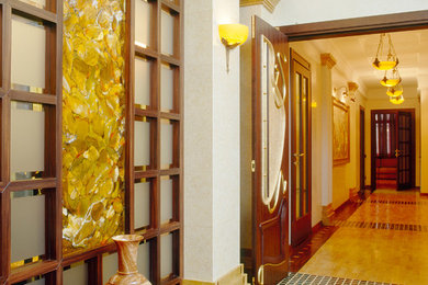 Hallway - mid-sized eclectic dark wood floor hallway idea in Other with beige walls