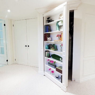 Elegant carpeted and white floor hallway photo in Ottawa with white walls