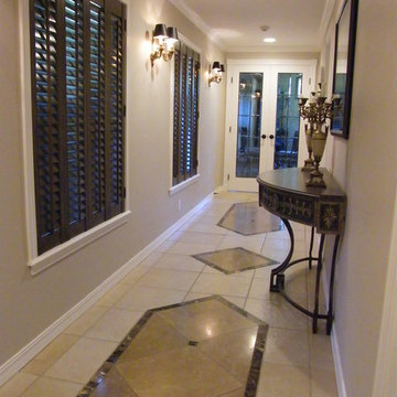 Break up a long hallway with some interesting tile work.