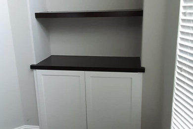 Built-in White Cabient with Black Shelves