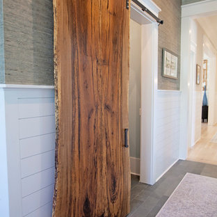 Example of a large farmhouse slate floor hallway design in Atlanta with multicolored walls