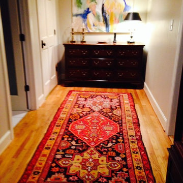 Caucasion Oriental Rug adds elements of geometry and jewel color tones...
