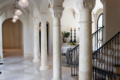 Inspiration for a huge mediterranean hallway remodel in Dallas with white walls