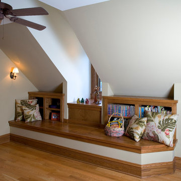 Custom Built Oak Bench with Fliptop Lid and Bookcase at Second Floor Stair