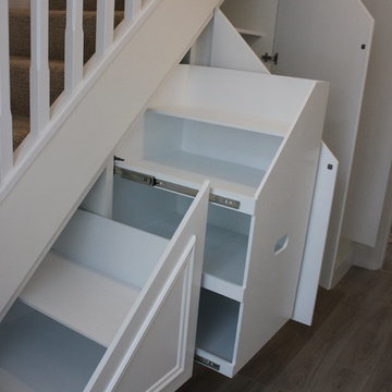 custom designed under stairs storage unit