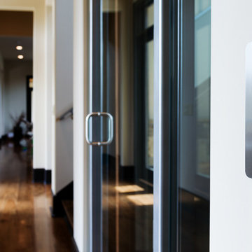 Custom Glass Elevator with power sliding glass doors