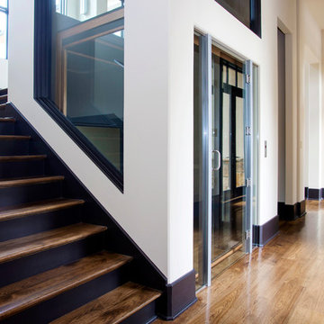 Custom Glass Elevator with power sliding glass doors