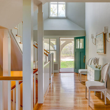 Entryway Hall & Teal Blue Front Door - Boston Magazine Design Home