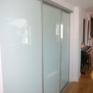 First Floor Hall - Laundry Closet behind Sliding Glass Doors