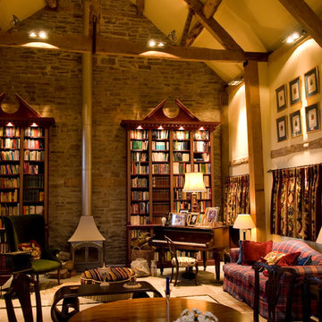 Gilded and painted library over several rooms in a converted 11th century barn