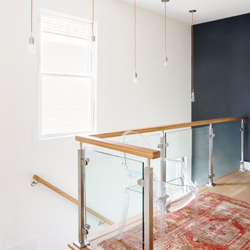 Glass Panel Staircase with Contemporary Pendant Lights