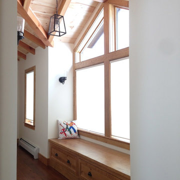 Hallway bench seat with exposed beams