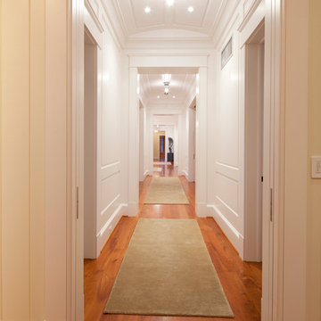 Hallway with extensive wall paneling