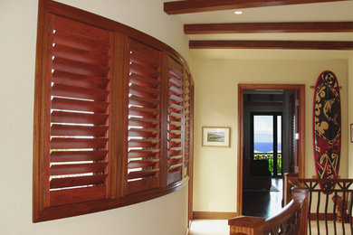 Hardwood Shutters on a Curved Hallway
