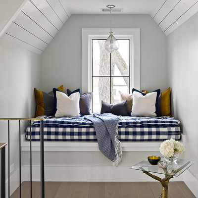 Example of a cottage brown floor hallway design in Chicago with gray walls