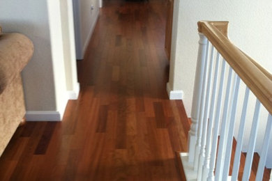 Example of a classic medium tone wood floor hallway design in San Francisco