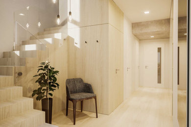Imagen de recibidores y pasillos minimalistas pequeños con paredes blancas, suelo vinílico y suelo amarillo