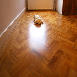 Istoria Bespoke Solid iroko parquet blocks installed in double herringbone patte