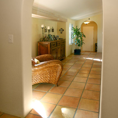 Hallway - mediterranean terra-cotta tile hallway idea in San Francisco