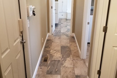 Hallway - small modern porcelain tile and multicolored floor hallway idea in Cincinnati with beige walls