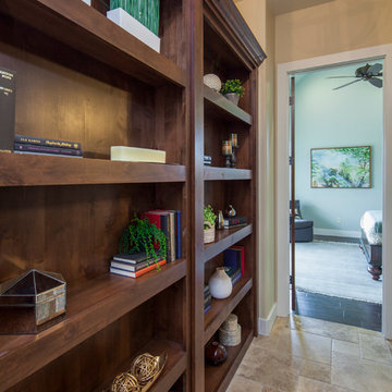 Library wall- opens to hidden wine cellar- 2014 Parade Home in Willie Nelson's T