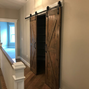 Linen Closet with Barn Doors