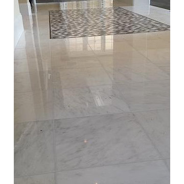 Marble 12" x 12" on a straight lay pattern  with a 48" x 60" mosaic stone inlay
