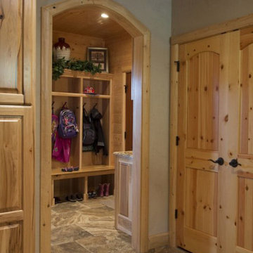 Mudroom locker drop zone space in a log home