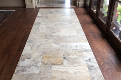 Inspiration for a mid-sized mediterranean marble floor hallway remodel in Houston with beige walls