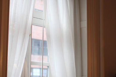 Mid-sized elegant hallway photo in New York with beige walls