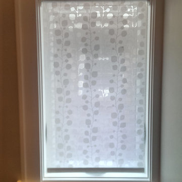 Patterned roller shade in a home in the Toronto Beaches