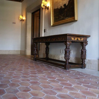 Inspiration for a timeless terra-cotta tile hallway remodel in Barcelona