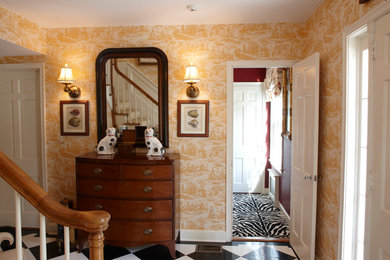 Inspiration for a mid-sized eclectic hallway remodel in Raleigh with yellow walls