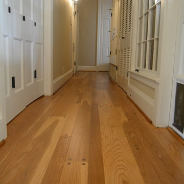 Random width white oak floors with walnut pegs - refinished with natural color