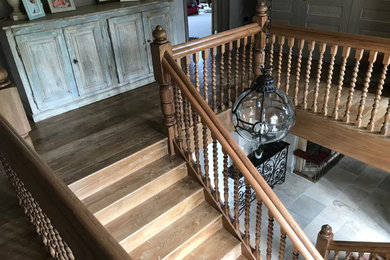 Photo of a medium sized classic staircase in Other.
