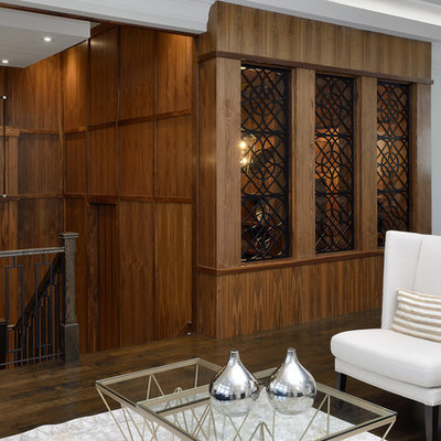Inspiration for a medium tone wood floor and brown floor hallway remodel in Toronto with gray walls
