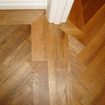 Solid smoked Oak Herringbone floor in Chingford