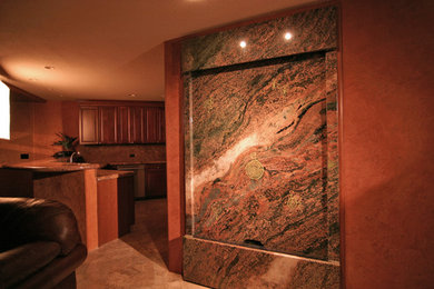 Hallway - large mediterranean porcelain tile and brown floor hallway idea in Phoenix with brown walls