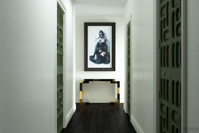 Hallway - mid-sized eclectic dark wood floor and brown floor hallway idea in New York with white walls