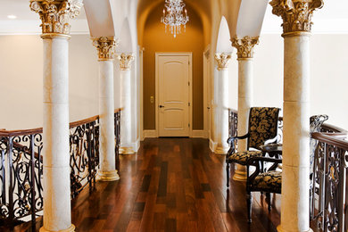 Hallway - traditional dark wood floor hallway idea in Toronto with beige walls
