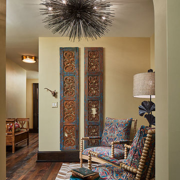 Upper Hallway Sitting Area with Paisley Chairs and Dramatic Light Fixture