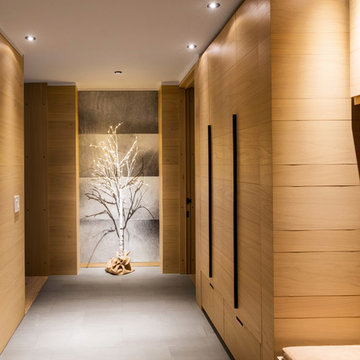 Hallway with Wood Flat-Panel Cabinets