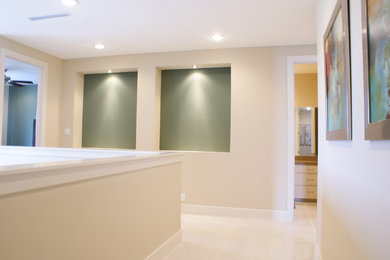 Example of a trendy porcelain tile hallway design in Austin with multicolored walls