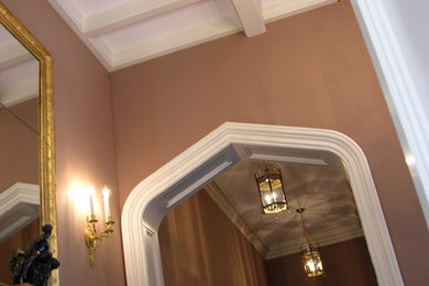 Hallway - traditional hallway idea in New York with brown walls