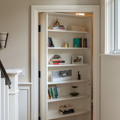 Hallway - coastal light wood floor hallway idea in Boston with gray walls
