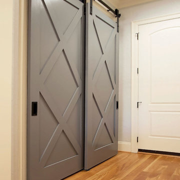 White Transitional Kitchen Featuring Custom Barn Door