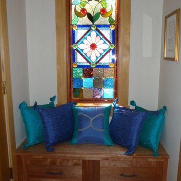 Window seat to accommodate with with antique stained glass