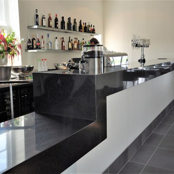 Alecs Resturant, Brentwood - 20mm Absolute Black Granite With 200mm Mitred Apron