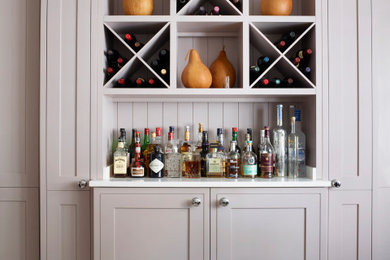 This is an example of a classic home bar in Hampshire.