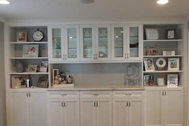Inspiration for a small transitional single-wall bar cart remodel in Philadelphia with shaker cabinets, white cabinets and marble countertops